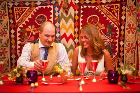 Bride and groom at low table 
