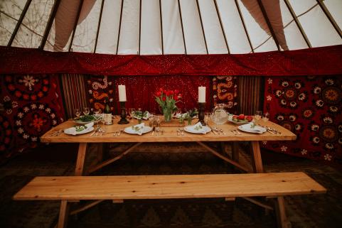 18ft yurt with stunning decor and 8ft banqueting table